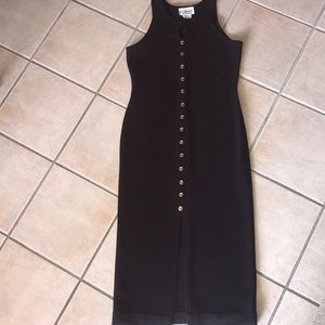 Vintage black dress with button accents